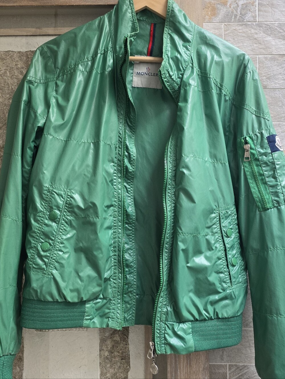 Men's Moncler bomber jacket in green, size 1.